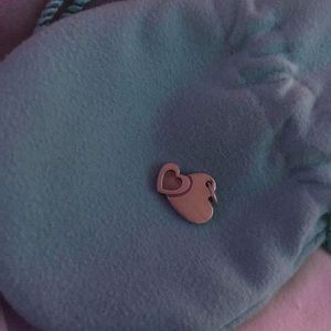 Tiffany & Co love charm. It’s beautiful!